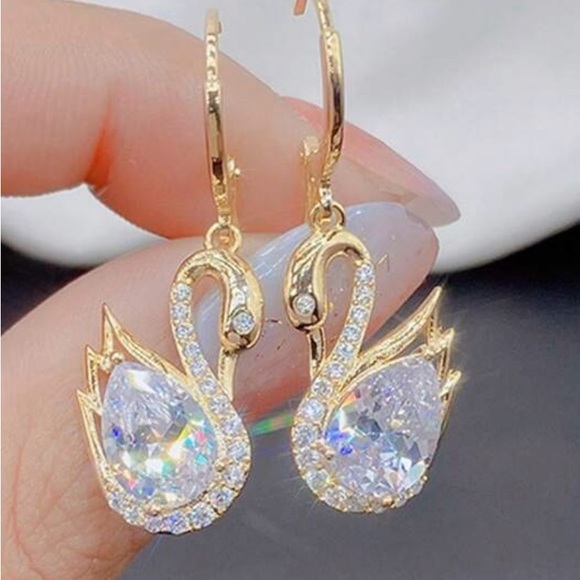 Elegant Gold Swan Earrings - Picture 4 of 4